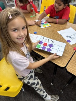 Girl showing her progress.